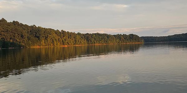 Calm lake at golden hour — Lake Russell fishing